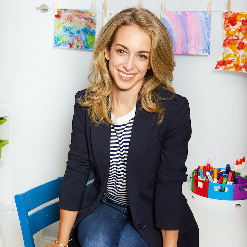 Headshot of Little Spoon’s partner, Dr. Becky, seated in blue chair in front of arts and crafts supplies.